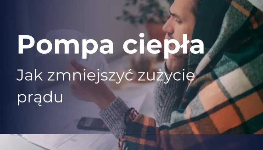 Pompa ciepła: jak zwiększyć wydajność i zmniejszyć zużycie prądu. Mężczyzna w kocu analizuje rachunki.